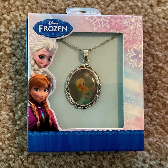 Frozen bundle: Elsa necklace, stickers, 1 pencil, and Olaf ring, new condition